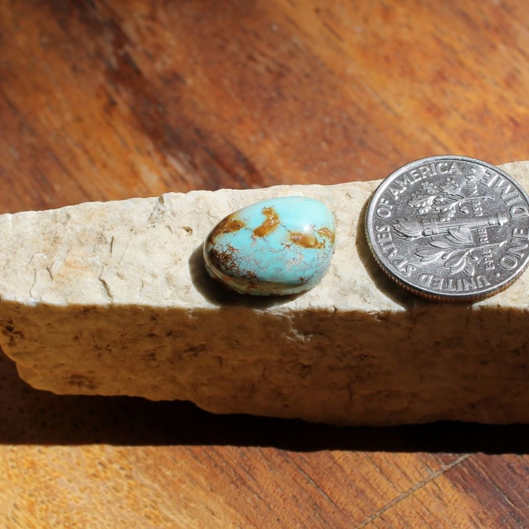 Natural blue turquoise cabochon w/ red inclusions (Stone Mountain Turquoise)
Instagram    $16 for 5.7 carats untreated & un-backed Nevada turquoise.
