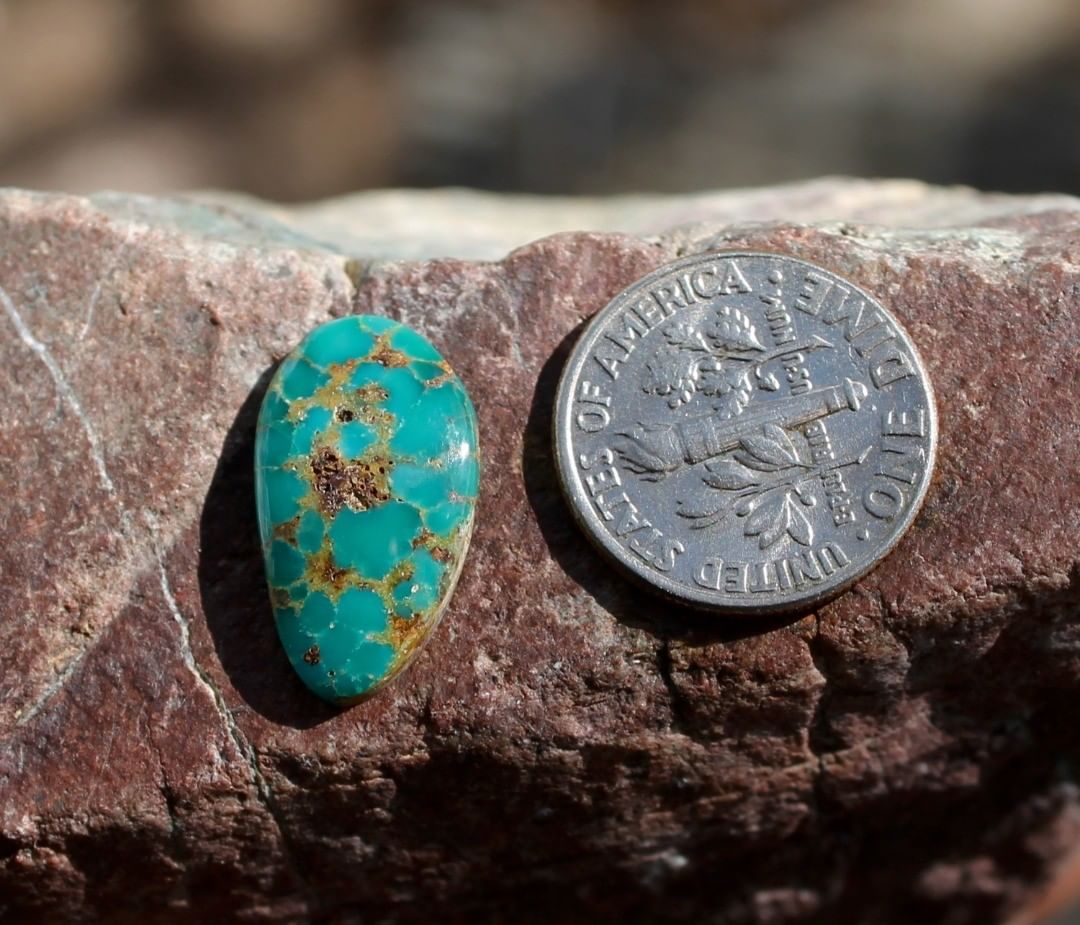 Natural Stone Mountain Turquoise cabochon w/ spiderweb matrix
Instagram    $13 for 5.0 carats untreated Nevada turquoise. 
